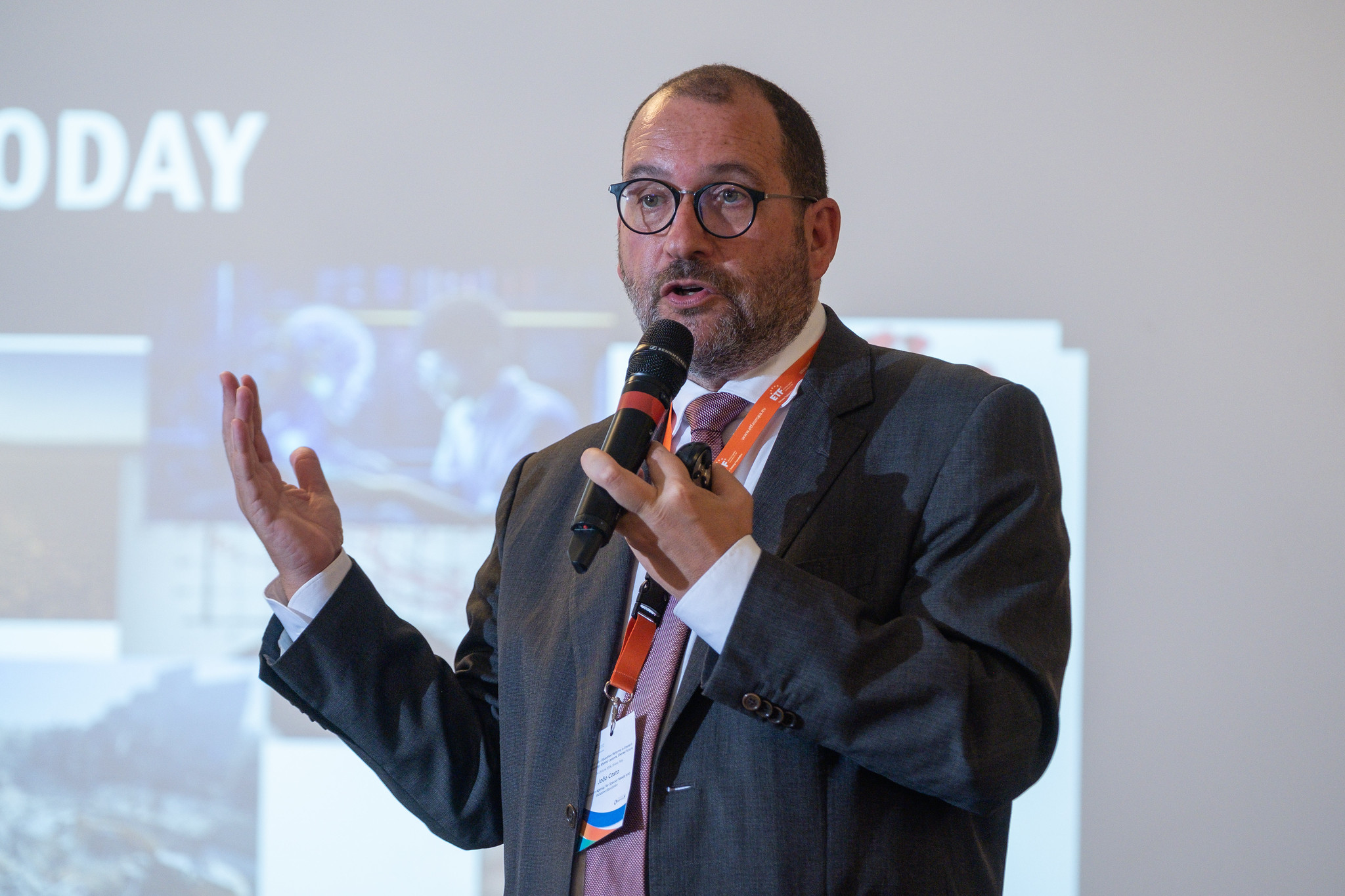 Portuguese former education minister, João Costa, dressed in a grey suit addresses participants at the June 2026 education Policy Lab in Stresa, Italy 