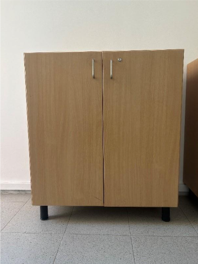 A wooden cabinet with a handle

AI-generated content may be incorrect.