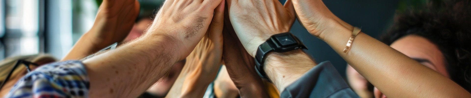 A picture of hands together to signify inclusion and togetherness