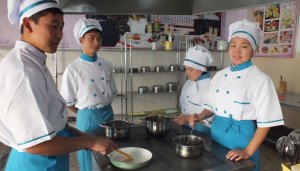 Kyrgyzstan: 4 students in a kitchen