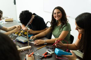 Students learning electrical circuitry
