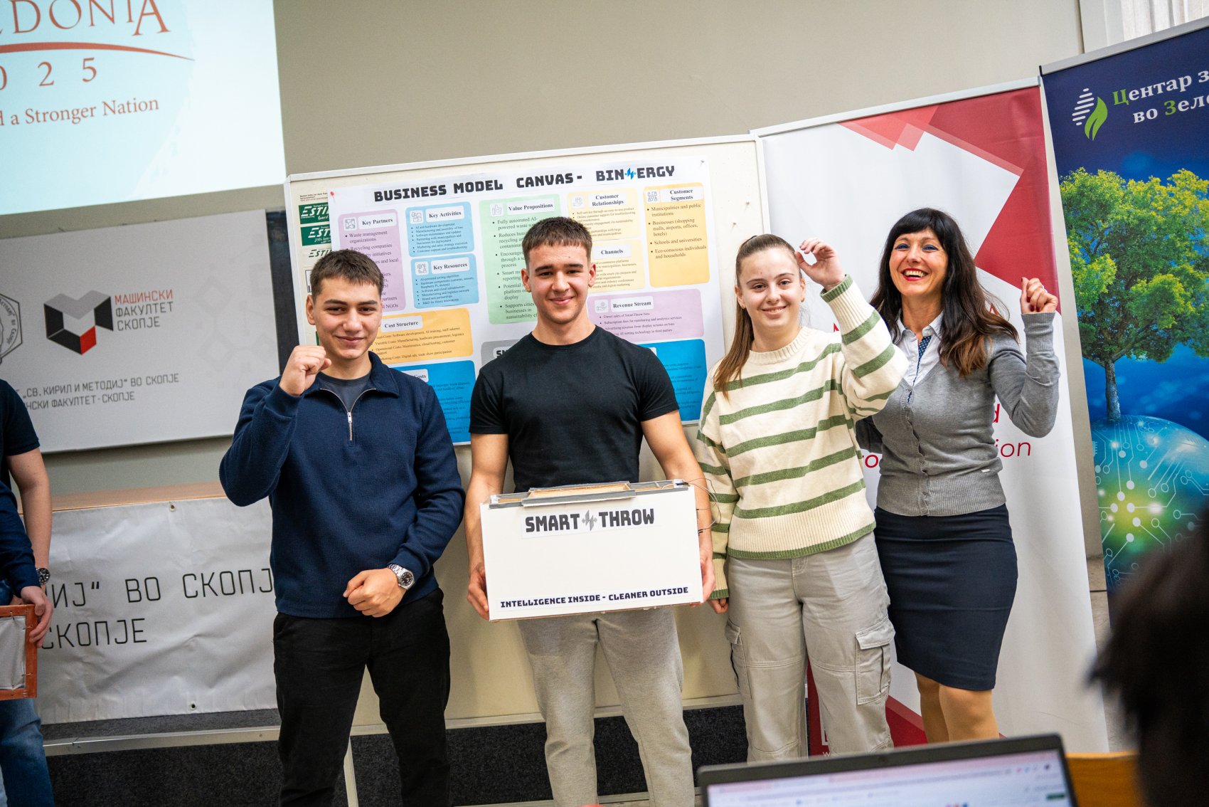 Students presenting their eco-business idea to the jury of a sustainable innovation competition