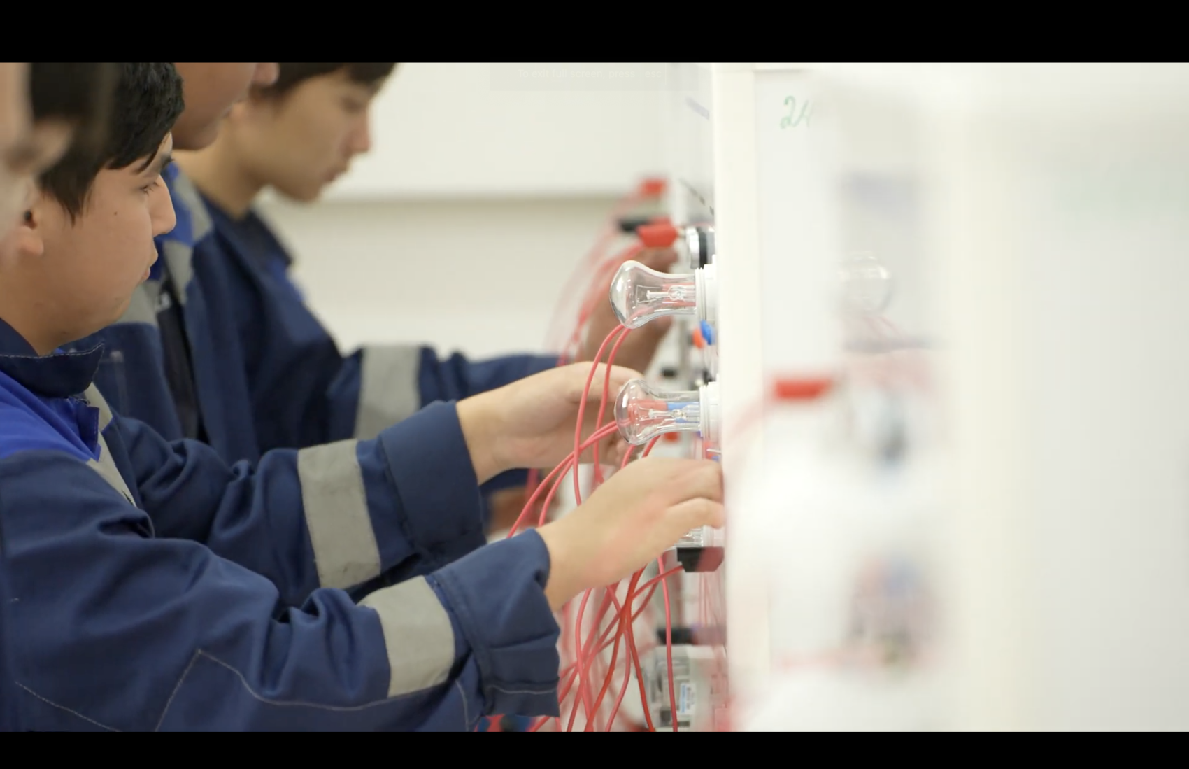 Students on a renewable energy training course in Kazakhstan involved in clean electricity production