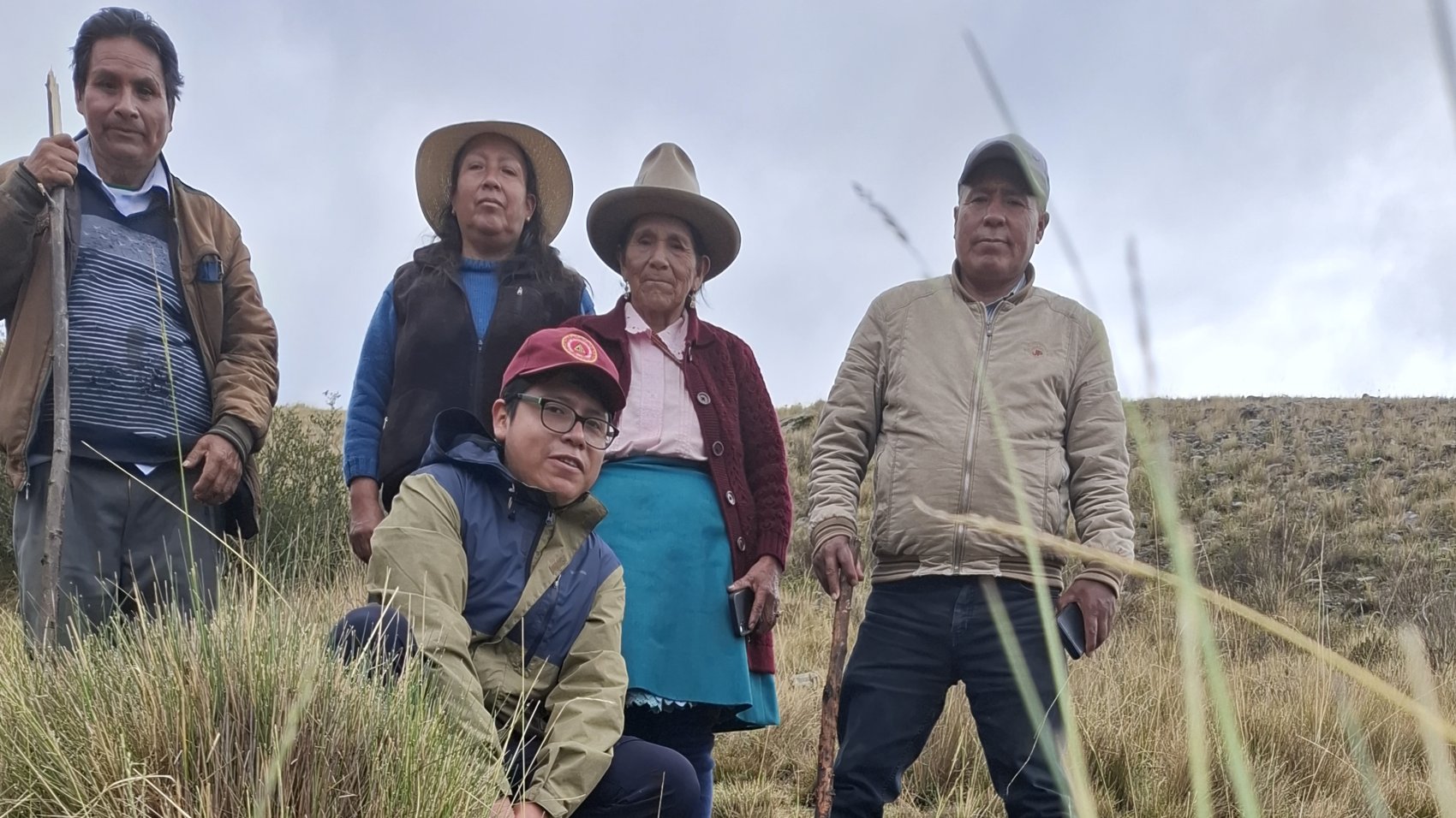 A young glacier ambassador with people from mountain communities