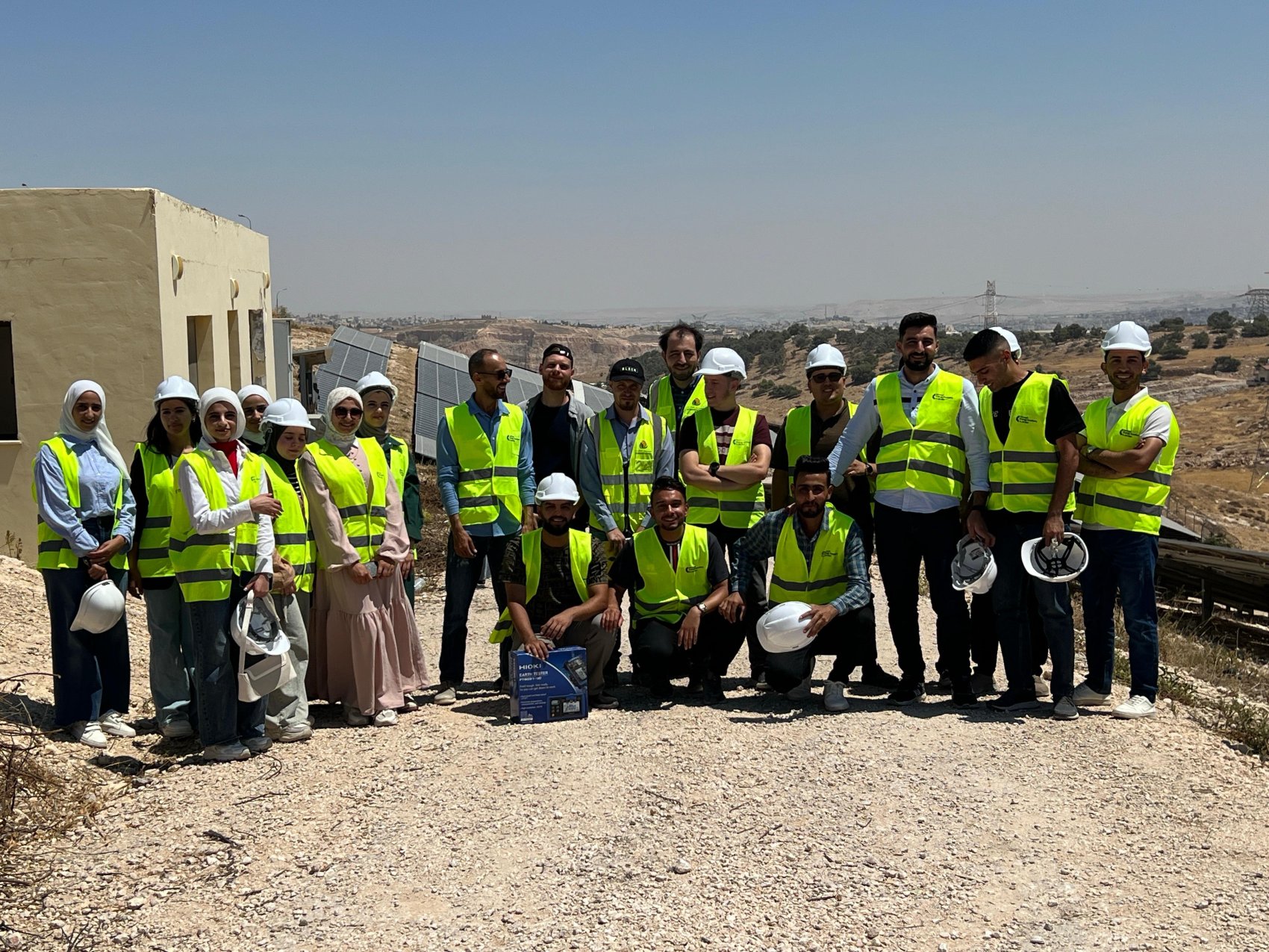 A group of solar panel engineers and trainees