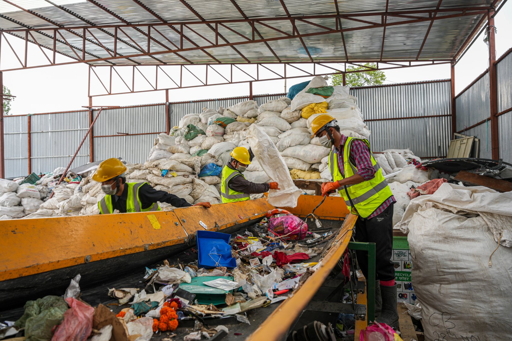 Workers in a waste management site