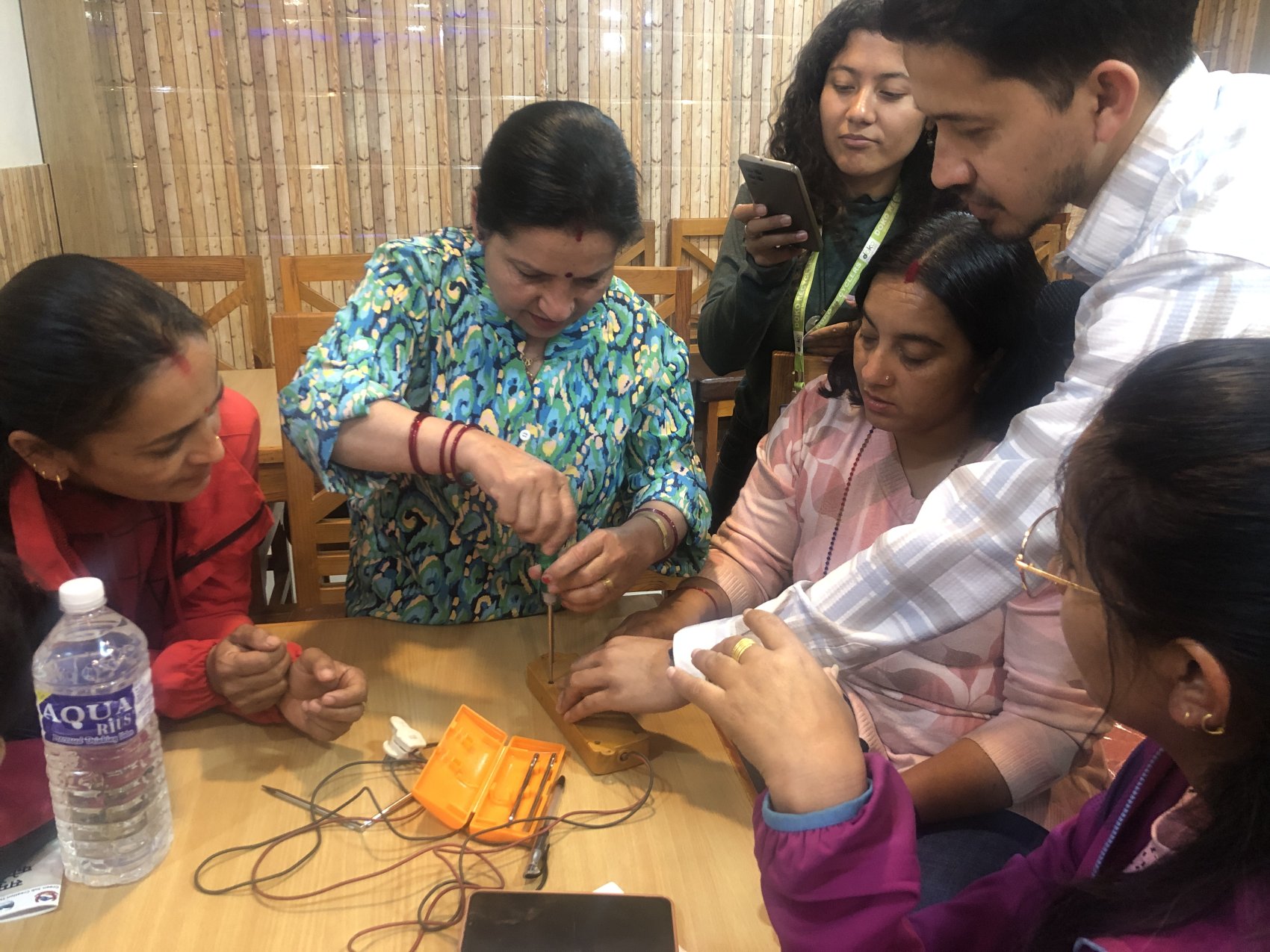 Women training in e-waste repair and recycling
