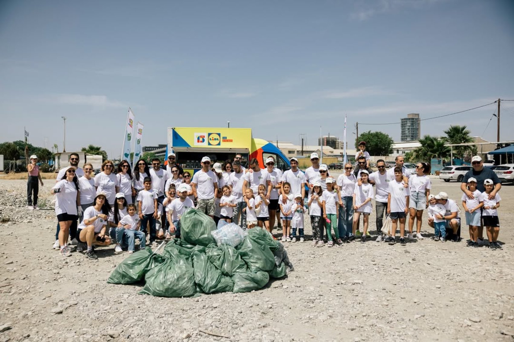 Young environmentalists cleaning the beach