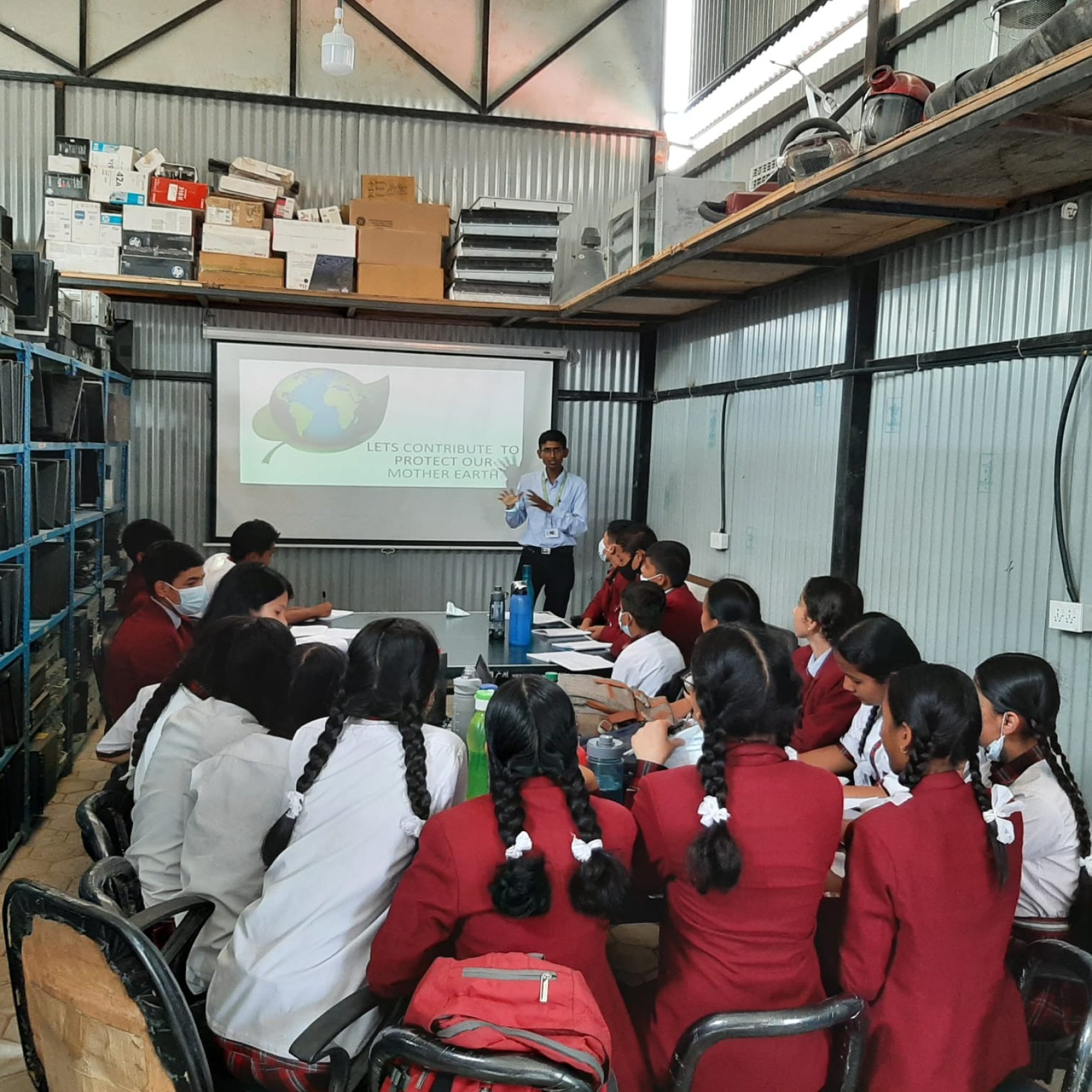 Children in an e-waste repair workshop