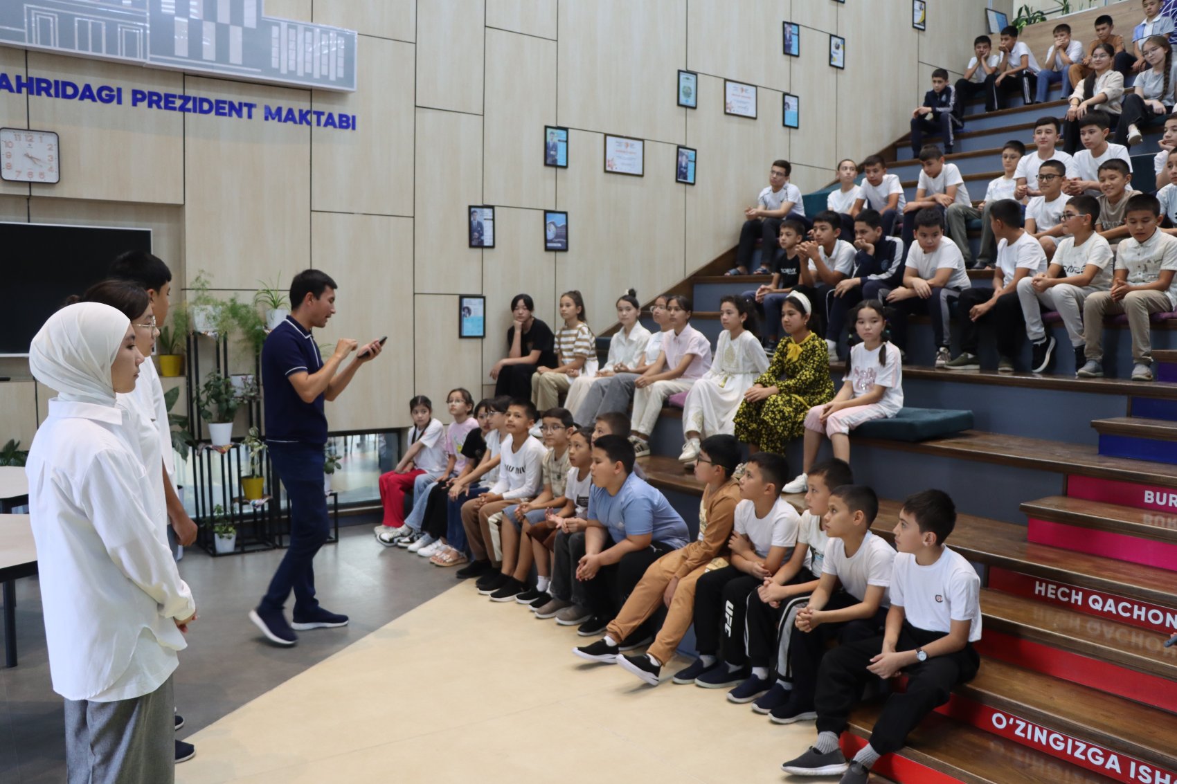 Students presenting environmental eco-club to other students